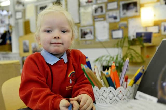Avah Curtis-Dawson in Rosemary Lane nursery waiting to do her colouring in.