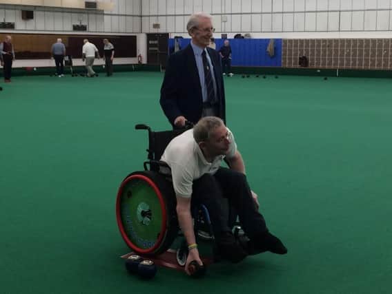 Fund-raiser George Duffell with Andy Semple of Para-Handy Bowling Wheelchairs at Houghton Sports Centre.
