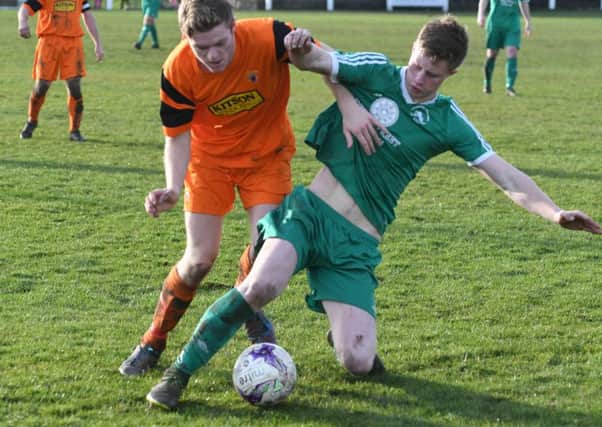 Easington Colliery (green) take on Alnwick Town in their recent Second Division clash.  Picture by Kevin Brady