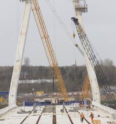 The deck will pass through the middle of the pylon.