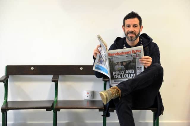 Julio Arca sits on the old Roker Park seats located in the Echos office.