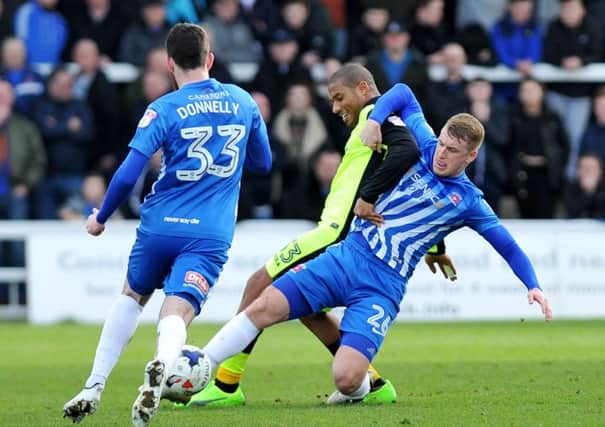 Pools' Scott Harrison battles against Exeter earlier this month. Picture by Frank Reid