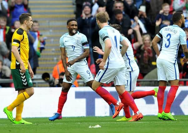 Jermain Defoe shows his delight at scoring England's opening goal against Lithuania. Picture by Frank Reid