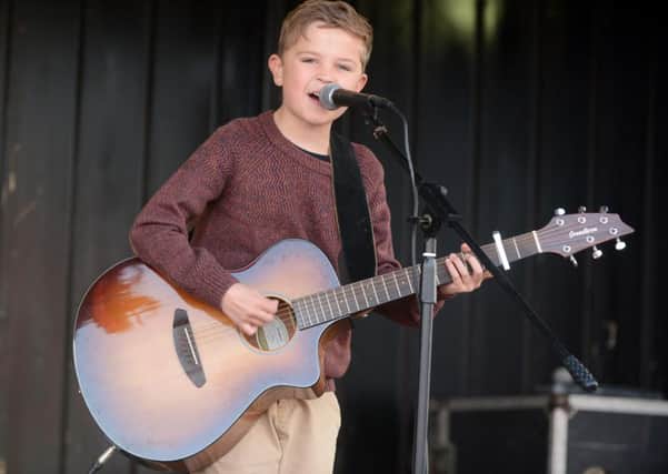 Tom Smith performing at the SAFC fan zone