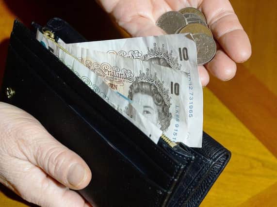 Nearly one million households are unable to cover the cost of two or more essential bills, a new study has found. Picture: PA.
