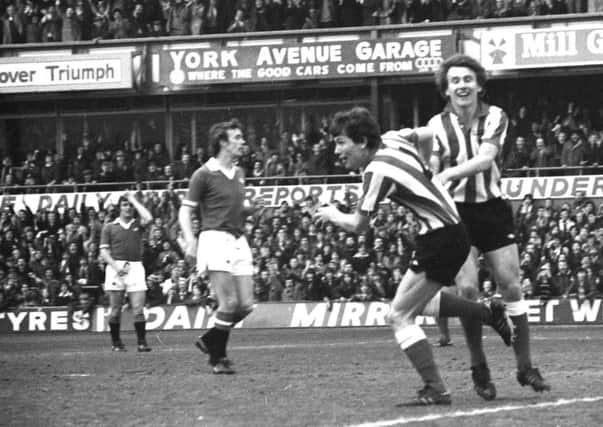 Kevin Arnott (left) turns away to celebrate putting Sunderland ahead against Manchester United in their dramatic Easter win in 1977. Pictures by Ken Parker.