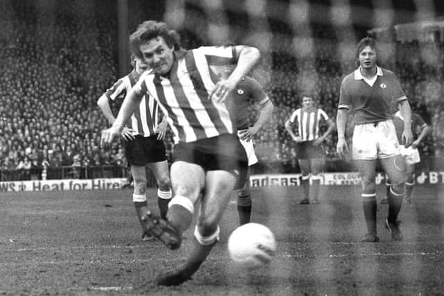 Tony Towers converts Sunderland's penalty winner, watched by United's David McCreery