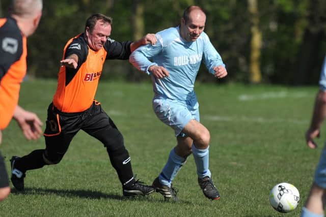 Washington JFC Biddick Inn battle against Rolls-Royce in the Over-40s League last weekend