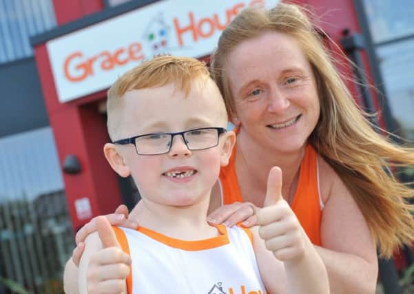 Nichola Mason with son Isaac, who will be taking part in the Race for Grace.