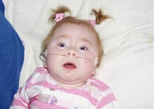 Evie Mason, who died aged two in 2005 after suffering from I-Cell disease.