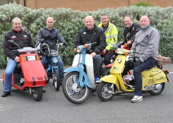 Steve Milner, centre, and fellow moped riders who will ride from Castletown to Barnard Castle to raise funds for Grace House.