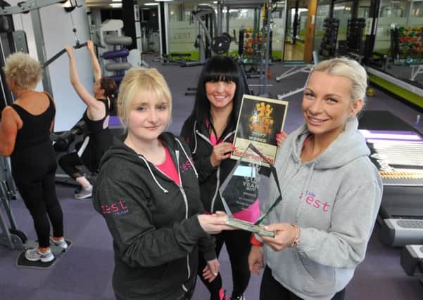 Sunderland Echo Gym of the Year winners Club Zest owners Holly McBride-Donaldson and Jennie Moyse, with manager Lorraine Belford, centre, with their award.
