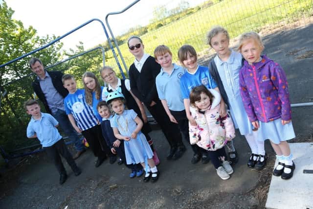 Members of Whitburn Neighbourhood Forum and kids who are campaigning to use the Charlie Hurley Centre.