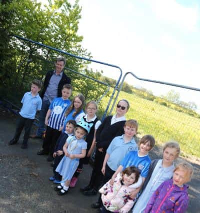 Members of Whitburn Neighbourhood Forum and kids who are campaigning to use the Charlie Hurley Centre.