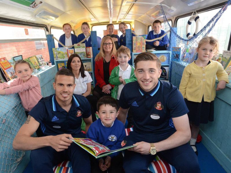 SAFC stars open new library at school as double-decker bus is transformed