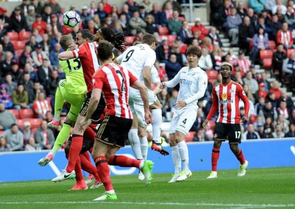 Fernando Llorente heads Swansea ahead against Sunderland today. Picture by Frank Reid