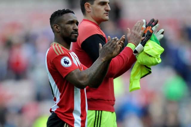 Jermain Defoe and Vito Mannone applaud the fans. Pictures by Frank Reid.