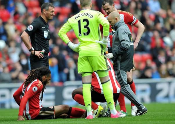 Jason Denayer gets treatment on Saturday before being forced off injured. Picture by Frank Reid
