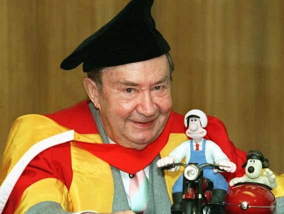 Actor Peter Sallis, the voice of Wallace from the Wallace and Gromit animated films, is pictured with the famous duo after receiving an Hononary Doctorate from the University of Bradford.