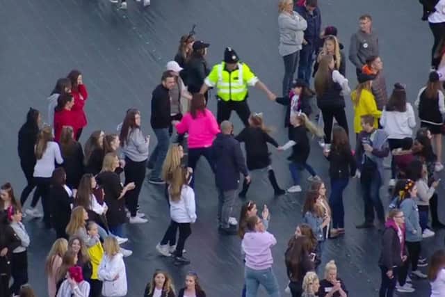 This moment, captured during the One Love Manchester concert, has gone viral. Picture: PA.