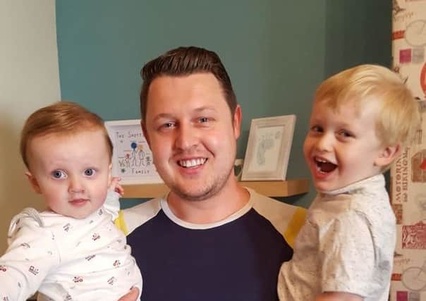 Gary Spottiswood with sons Eli and Archie
