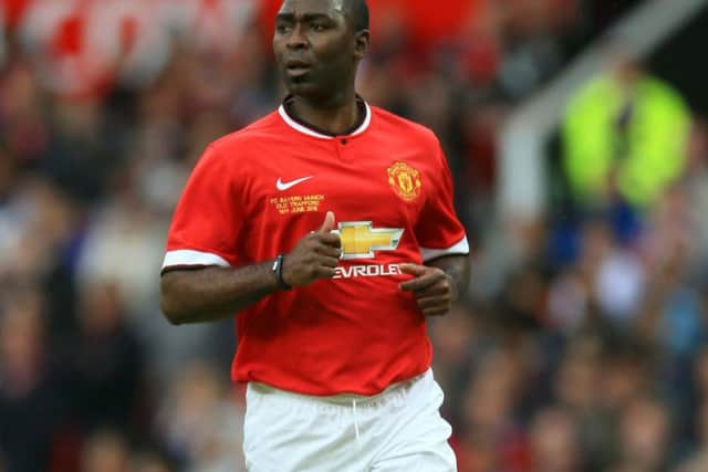 Andrew Cole questions what's being done to check footballers for heart conditions.