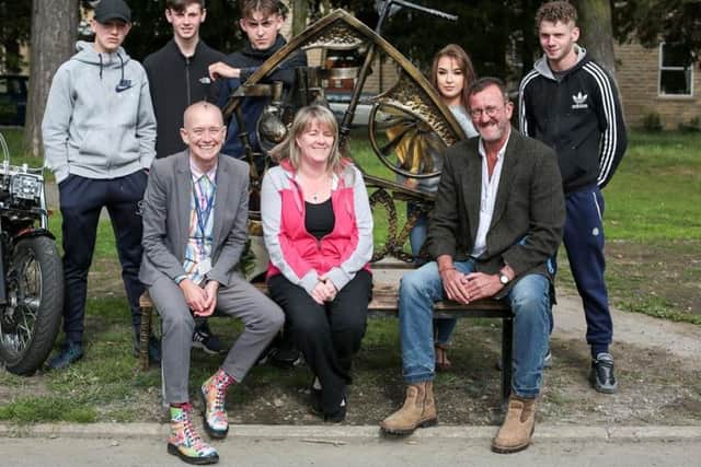Camerons friends and Fiona with 3 Towns AAP co-ordinator Sandy Denney, front left, and sculptor Graeme Hopper, front right. The friends are, from left, Matty Wraith, Kian Johnson, Ellis Hanley, Laura Cowan and Liam Walsh.