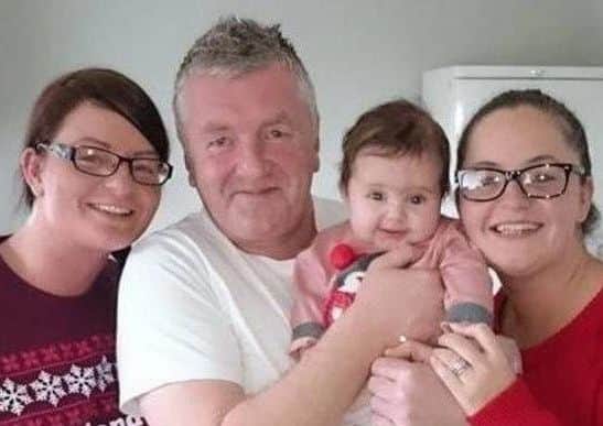 Stewart Anderson, pictured holding granddaughter Neve Allcroft, with daughters Kelly Beston, left and Kay Allcroft.