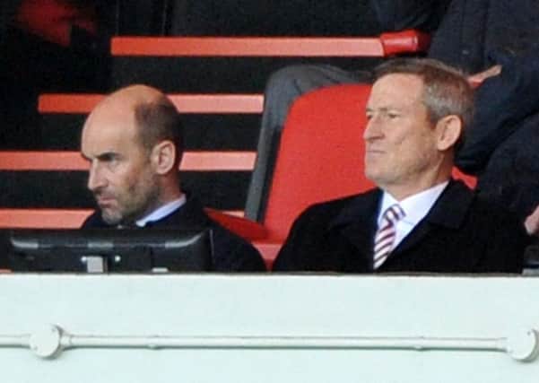 Sunderland chief  executive  Martin Bain and owner Ellis Short cast their eyes of a dismal season.