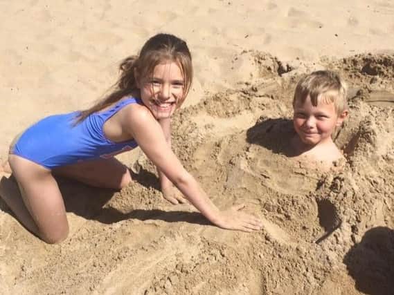 Nikki Cunningham sent us this picture of her daughter Lydia, 11, and son Jacob, 7, on the beach at South Shields.