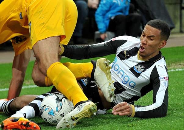 Newcastle midfielder Isaac Hayden battles against Preston last season. Picture by Frank Reid.