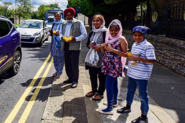 Sunderland Sikhs hand out cold drinks to celebrate Chabeel Day.