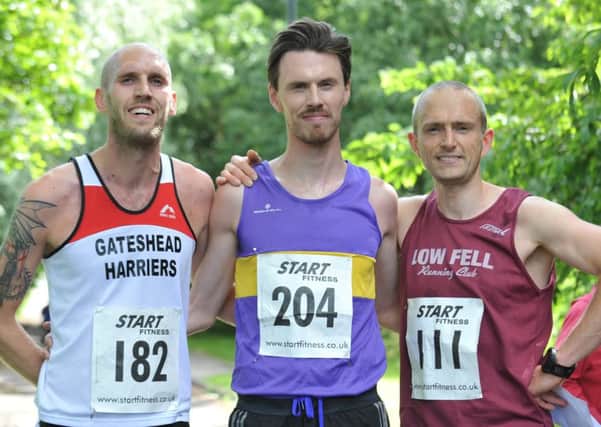 Washington Running Club's Bottoms Up Cup 5k Race winner Kurt Heron (centre), with runner-up Paul Waller (left) and third-placed Stephen McGrath. Picture by Tim Richardson.