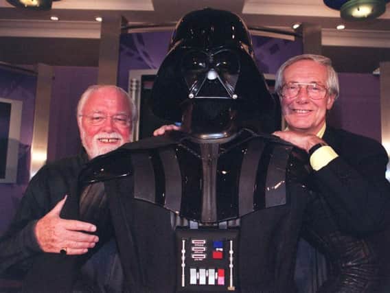 Barry Norman, pictured right with the late Sir Richard Attenborough and a Darth Vader model, has died at the age of 83.