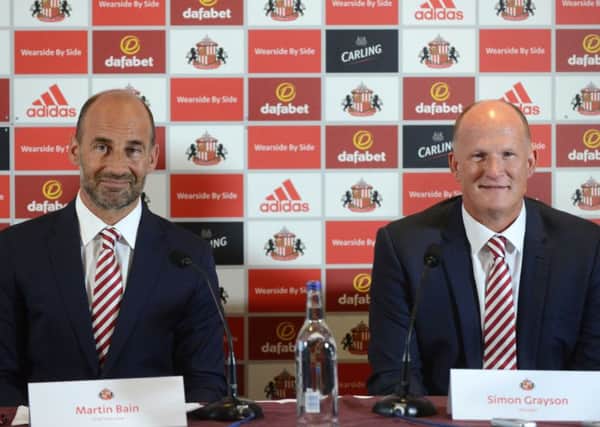 Sunderland AFC new manager Simon Grayson with CE Martin Bain (L)