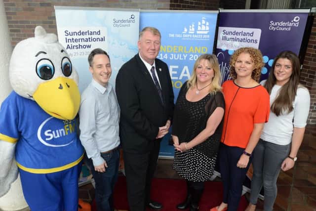 Sunderlands Tall Ships official partners.
From left Sun FM mascot, SunFM Mark Black, Coun John Kelly, North East Press Editorial Director Joy Yates, Sunderland City Council head of events Victoria French and BBC Catherine Peart