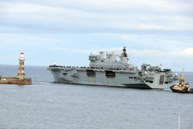 HMS Ocean heads out to sea.