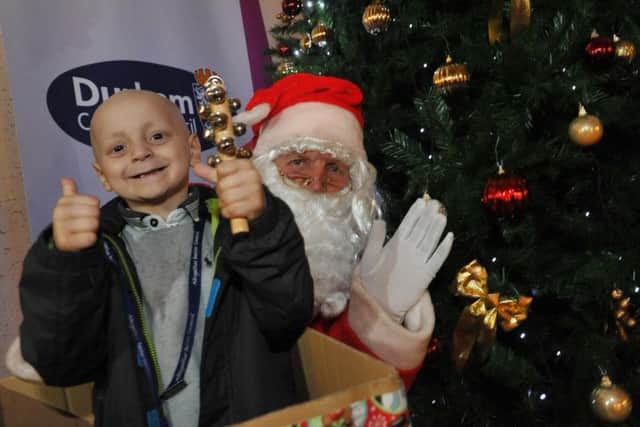 Bradley Lowery pictured as he met Santa when he helped light up County Hall for Christmas.