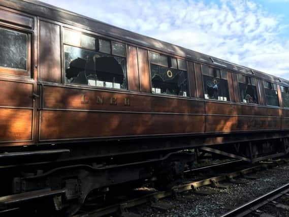 Picture issued by North Yorkshire Moors Railway of one of a set of antique train carriages that have been vandalised