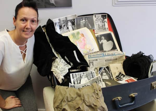 Barnes Court Home Manager Mandy Mackley with the discovered suitcase