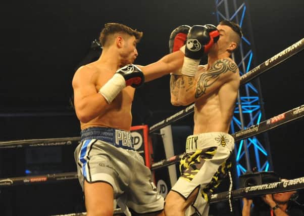Josh Kelly beats Tom Whitfield at the Walker Activity Dome. Picture by TIM RICHARDSON