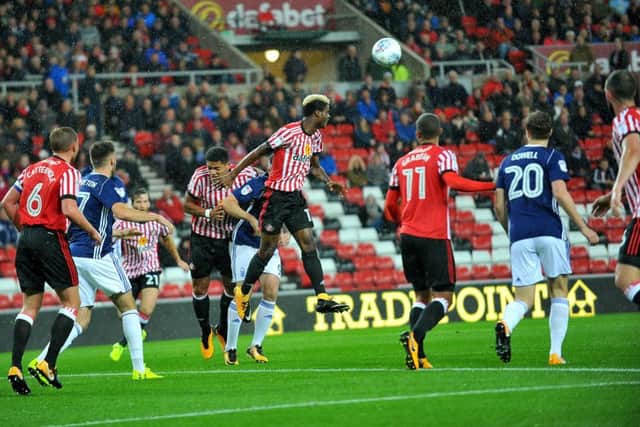 Didier Ndong clears with a header