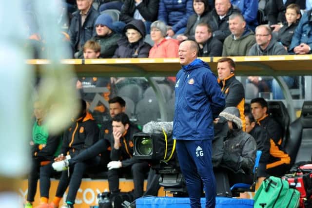 Simon Grayson watches on at Hull.