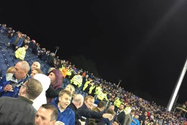 Police and stewards moved people out of the stand following the incident at the Emirates Riverside Ground in Chester-le-Street. Photo by Sharon Fleet.
