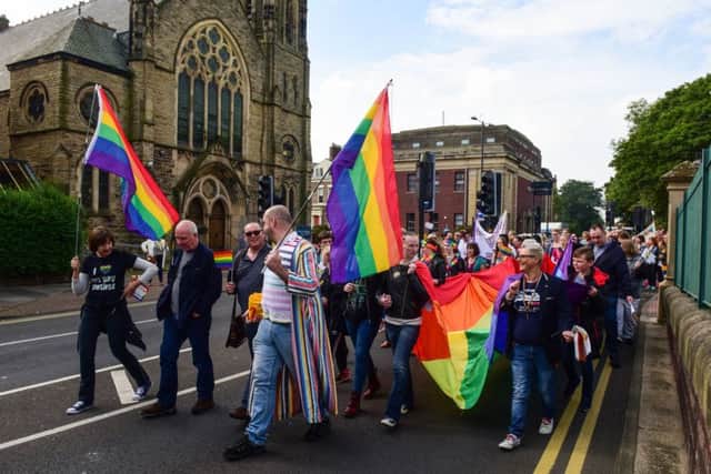 The Pride parade makes its way past Mowbray Park