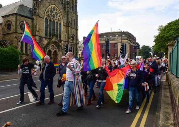 The Pride parade makes its way past Mowbray Park