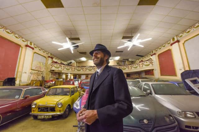 The Director of Beamish Museum, Richard Evans, looks around  the former Grand Electric Cinema in St.Paul's Terrace, Ryhope, which had been used for storage.