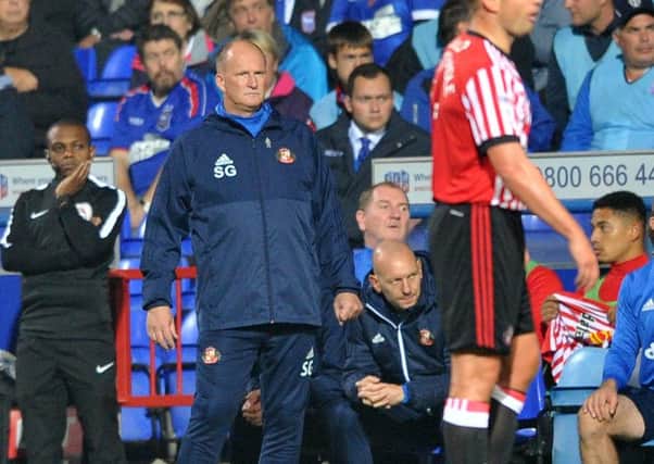 Sunderland boss Simon Grayson remains stoney faced as his team were punished by Ipswich Town on Tuesday night.