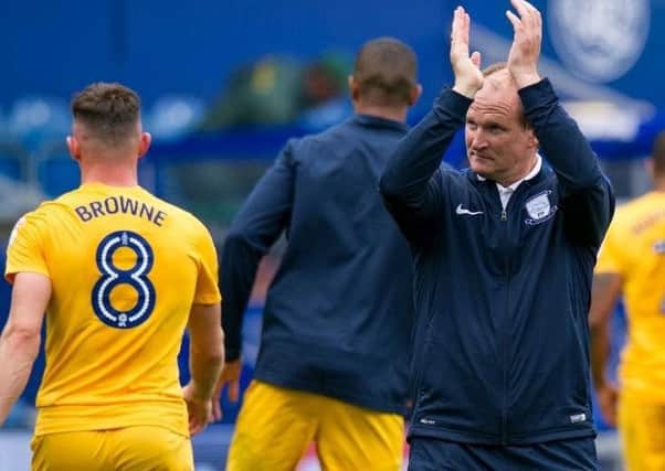Simon Grayson applauds the fans during his time as Preston manager