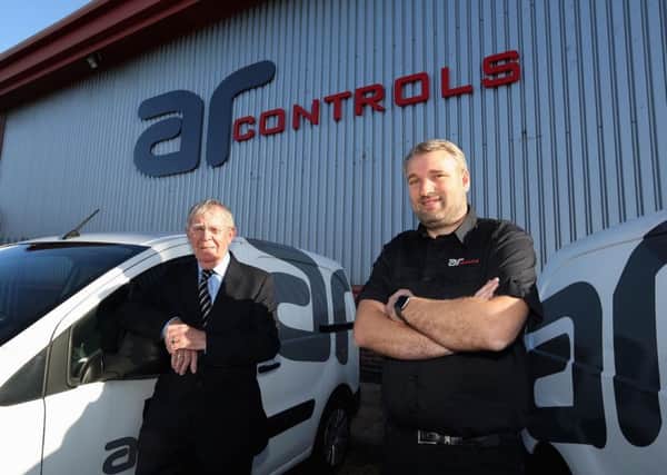 Andrew Ramsey of AR Controls and Councillor Harry Trueman.